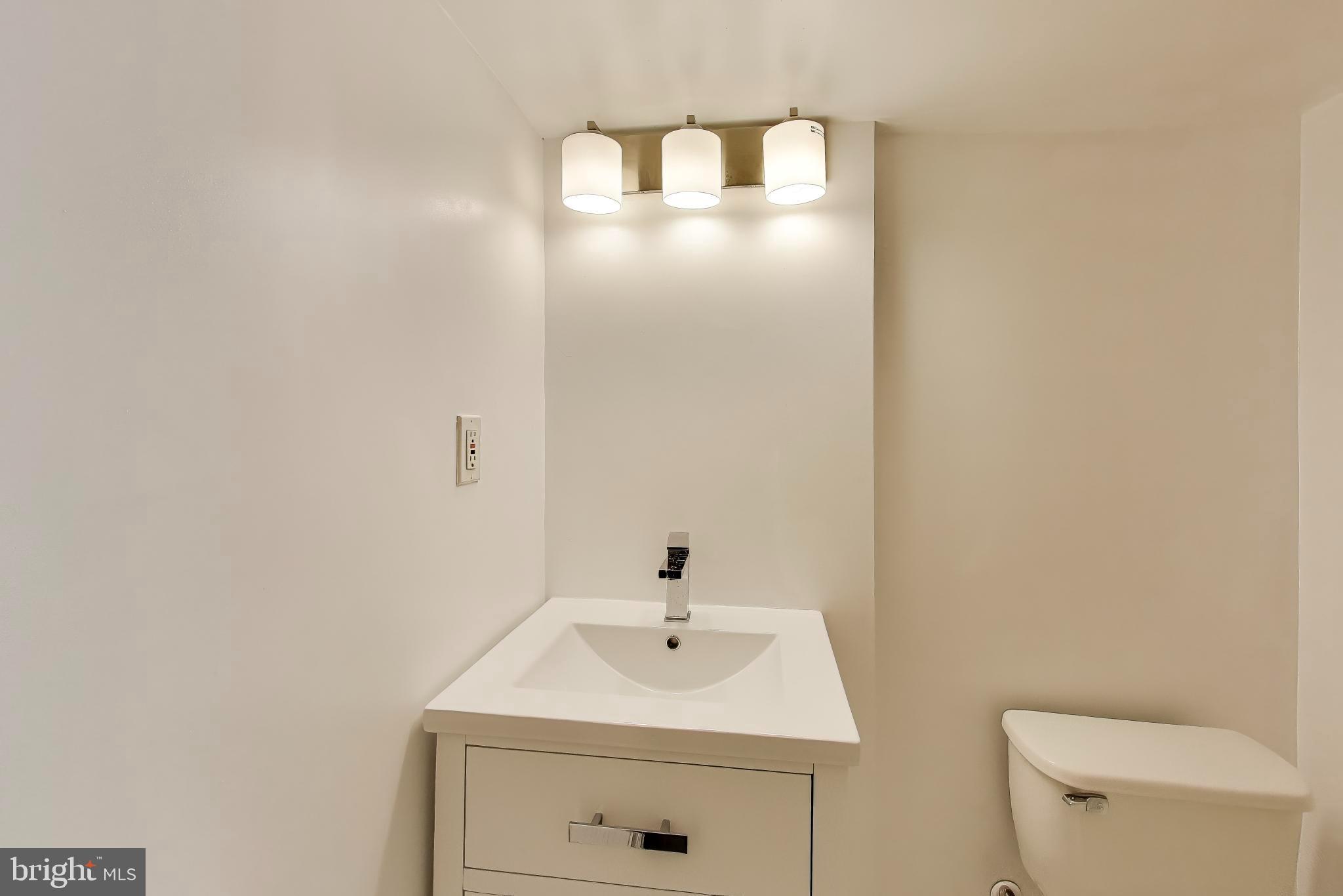 743 Hamilton Street Northwest Washington, DC 20011 - Photo 30 of 43 Updated fixtures and lighting.