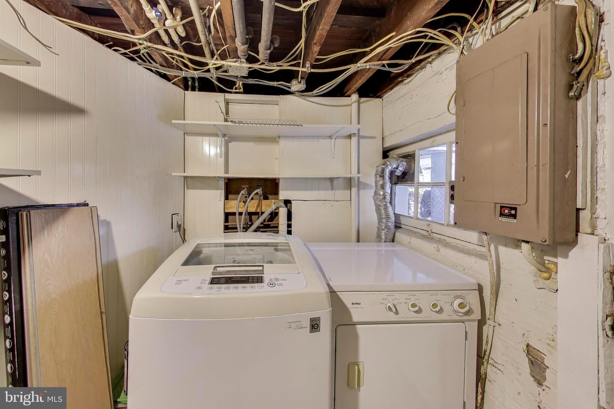 743 Hamilton Street Northwest Washington, DC 20011 - Photo 32 of 43 Laundry , utilities, storage, egress to backyard.