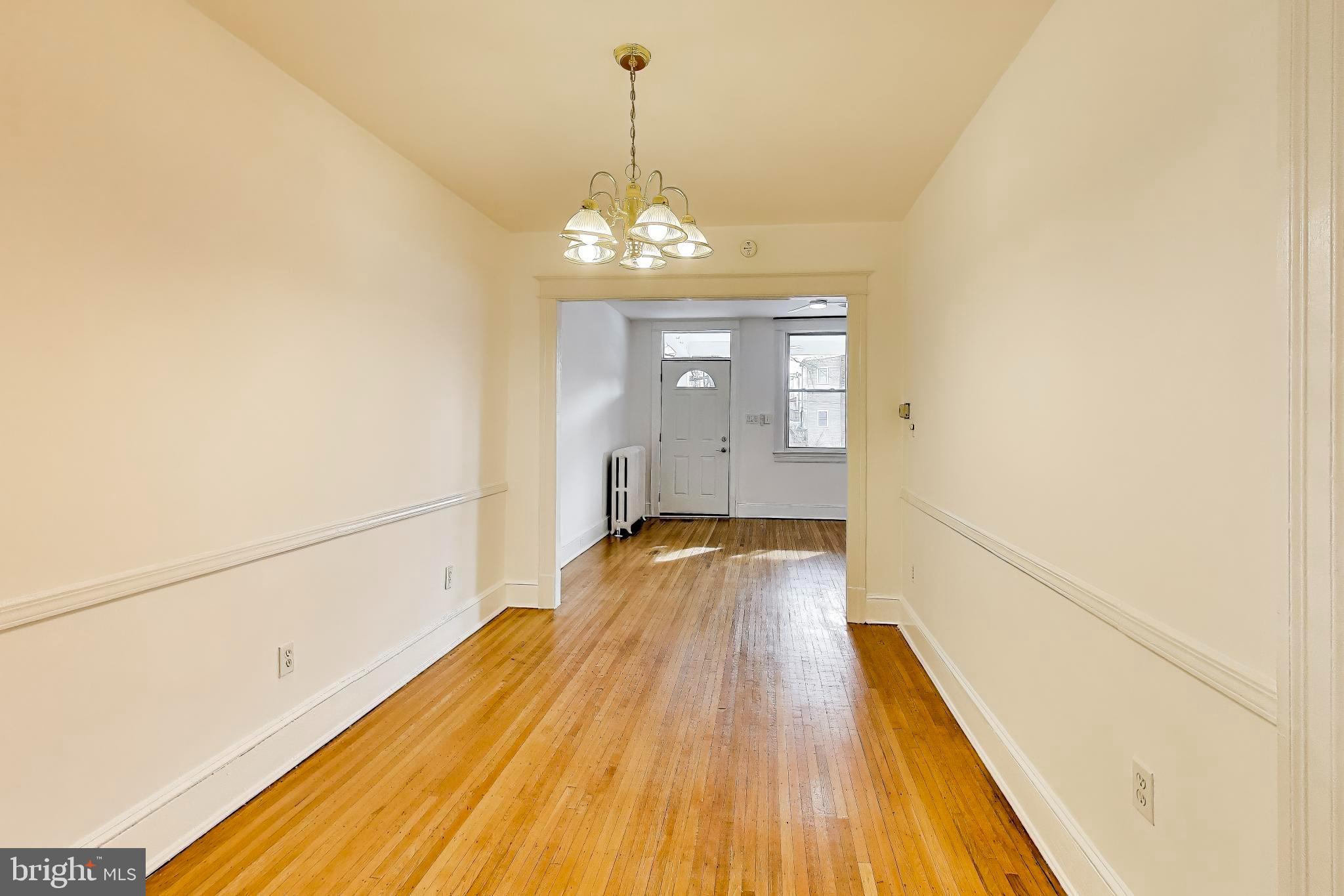 743 Hamilton Street Northwest Washington, DC 20011 - Photo 9 of 43 Warm newly refinished wooden floors throughout.