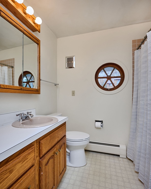 72 North Main Street New Salem, MA 01355 - Photo 16 of 29 a bathroom with a sink a toilet and vanity