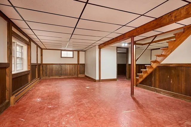 a view of an empty room with stairs