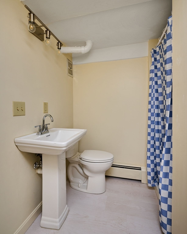 72 North Main Street New Salem, MA 01355 - Photo 21 of 29 a bathroom with a sink toilet and shower