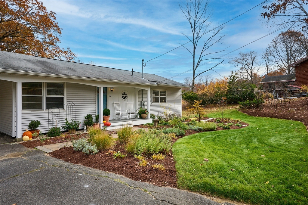 72 North Main Street New Salem, MA 01355 - Photo 3 of 29 a front view of a house with yard patio and green space