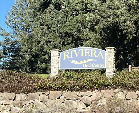 a sign on the side of a road