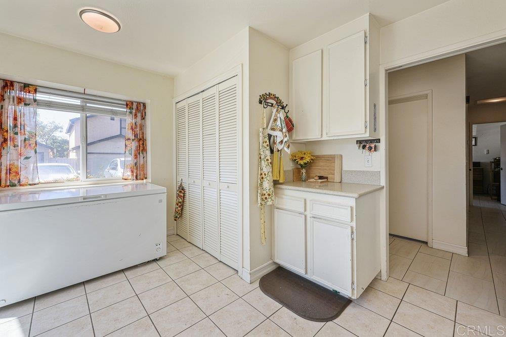 10385 Seth Way Santee, CA 92071 - Photo 10 of 33 a room view with a window and a refrigerator