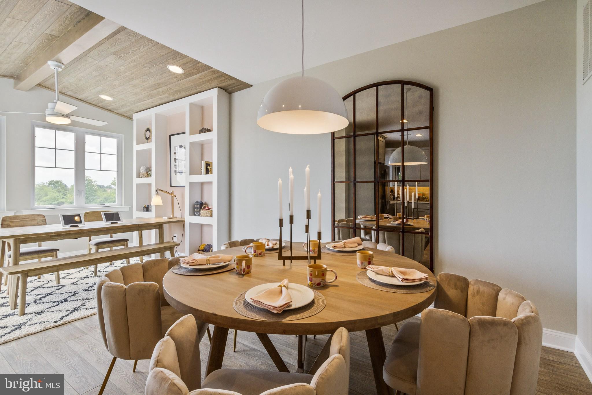 2 Jameson Way, Unit BASE Chalfont, PA 18914 - Photo 18 of 34 a view of a dining room with furniture and window