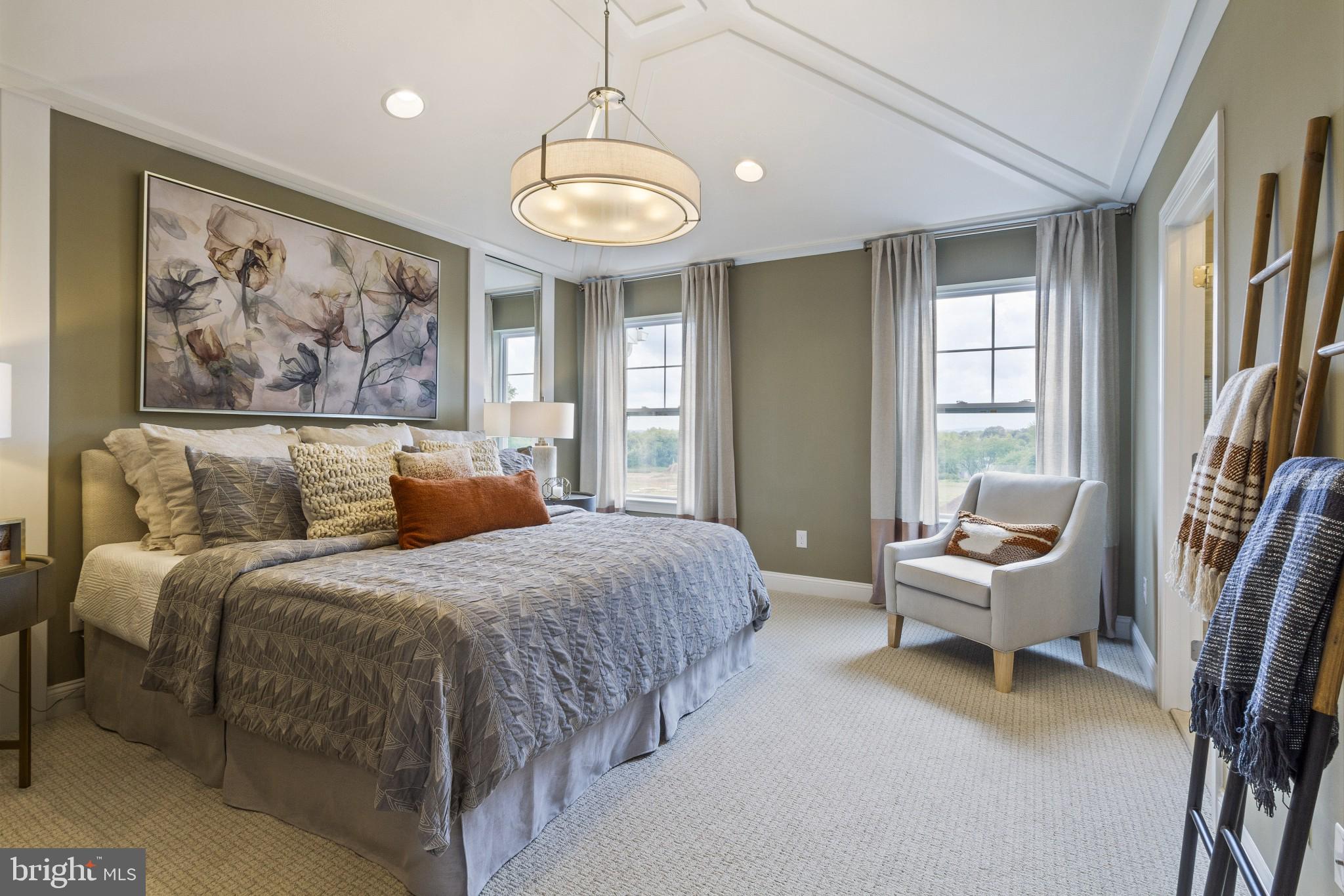 2 Jameson Way, Unit BASE Chalfont, PA 18914 - Photo 22 of 34 a spacious bedroom with a bed and a large window