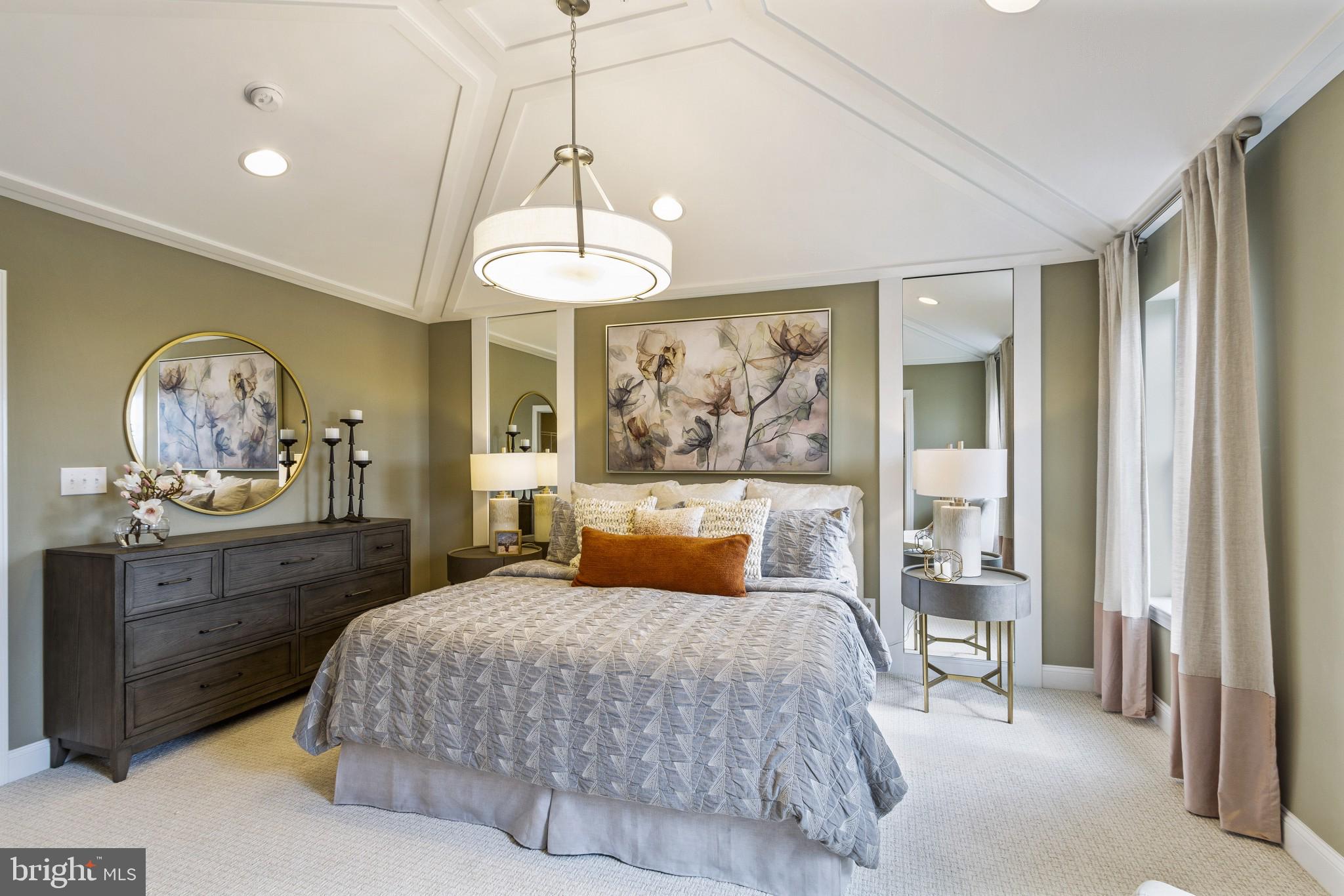 2 Jameson Way, Unit BASE Chalfont, PA 18914 - Photo 24 of 34 a bedroom with a bed and a chandelier