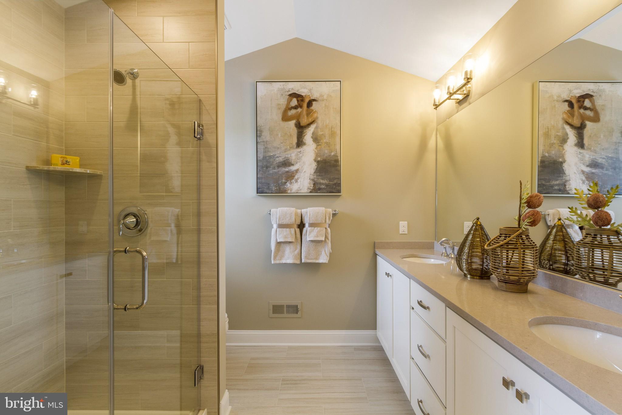 2 Jameson Way, Unit BASE Chalfont, PA 18914 - Photo 26 of 34 a bathroom with a granite countertop sink a mirror a shower and a bathtub