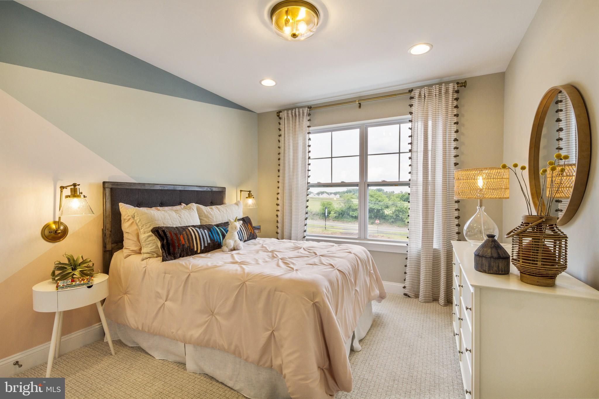 2 Jameson Way, Unit BASE Chalfont, PA 18914 - Photo 32 of 34 a bedroom with a bed and a window