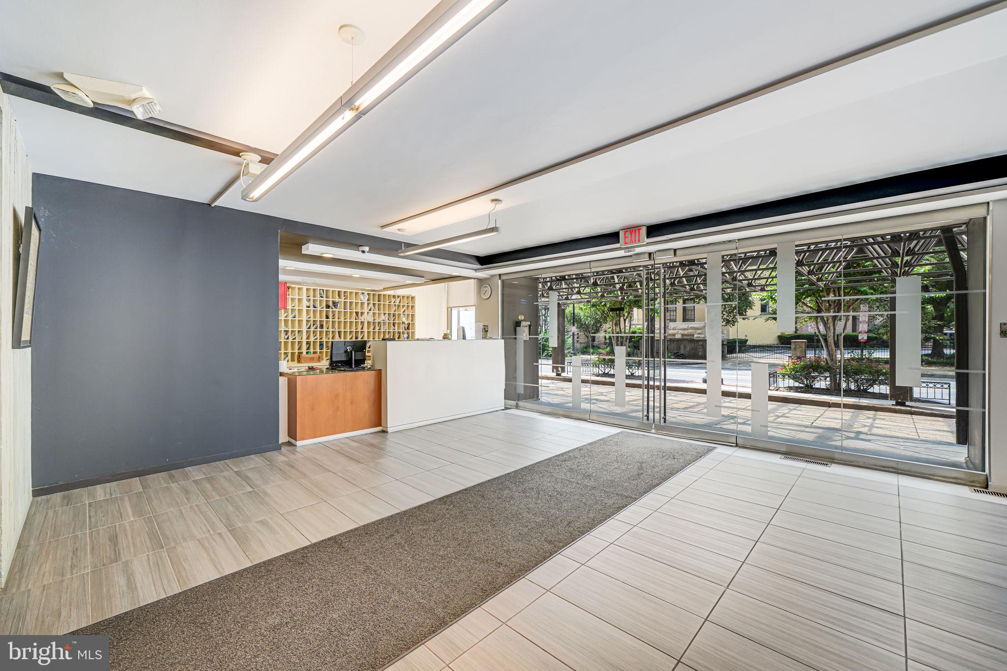 1545 18th Street Northwest, Unit 411 Washington, DC 20036 - Photo 12 of 37 a living room with a large window