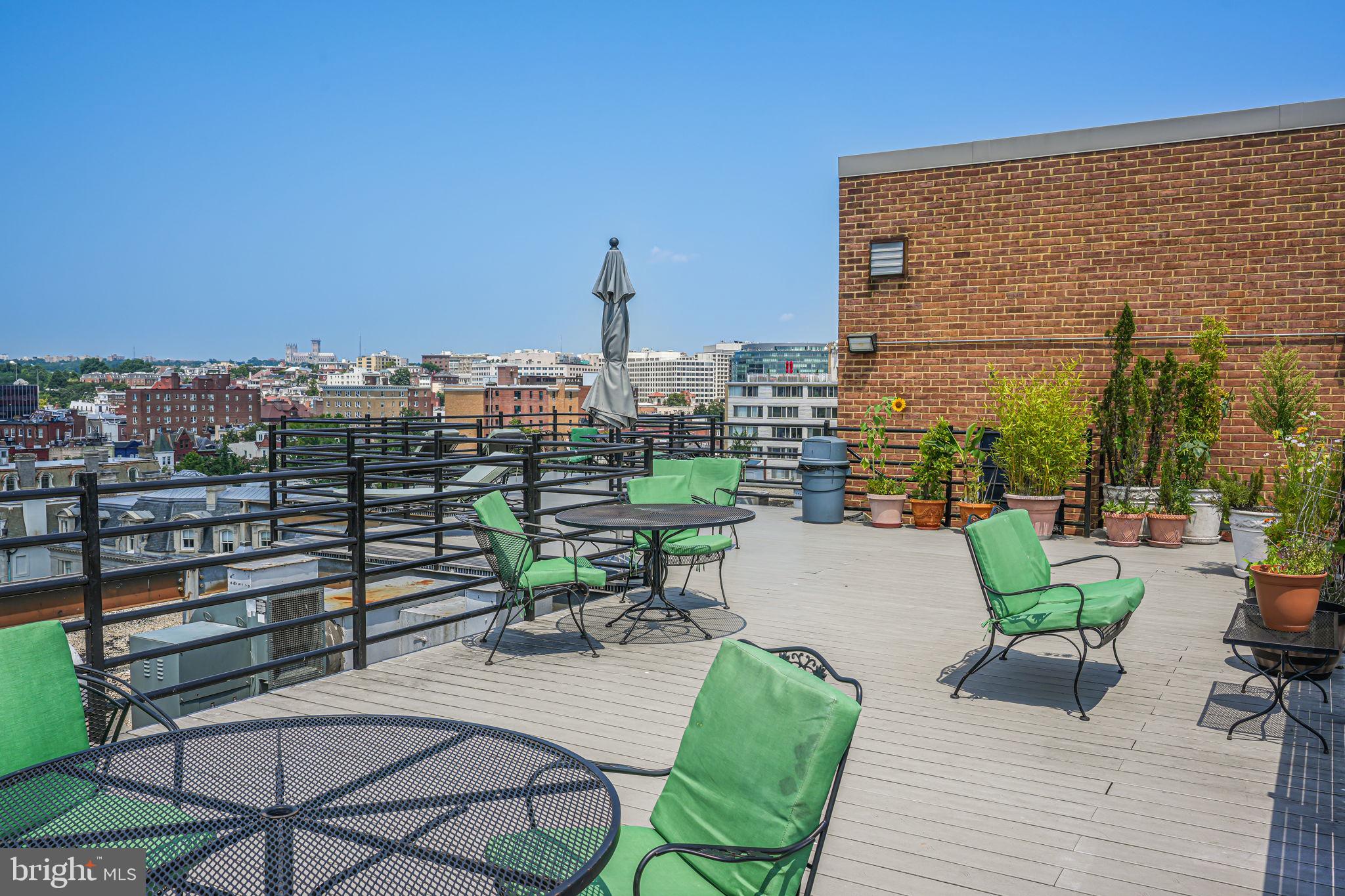 1545 18th Street Northwest, Unit 411 Washington, DC 20036 - Photo 17 of 37 a view of a terrace with furniture