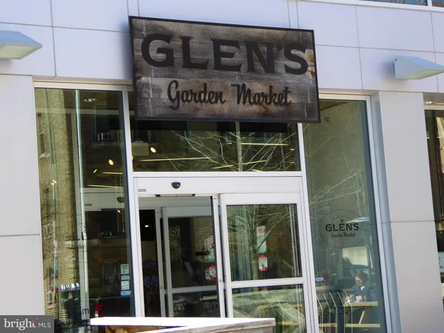 a view of a building with sitting area