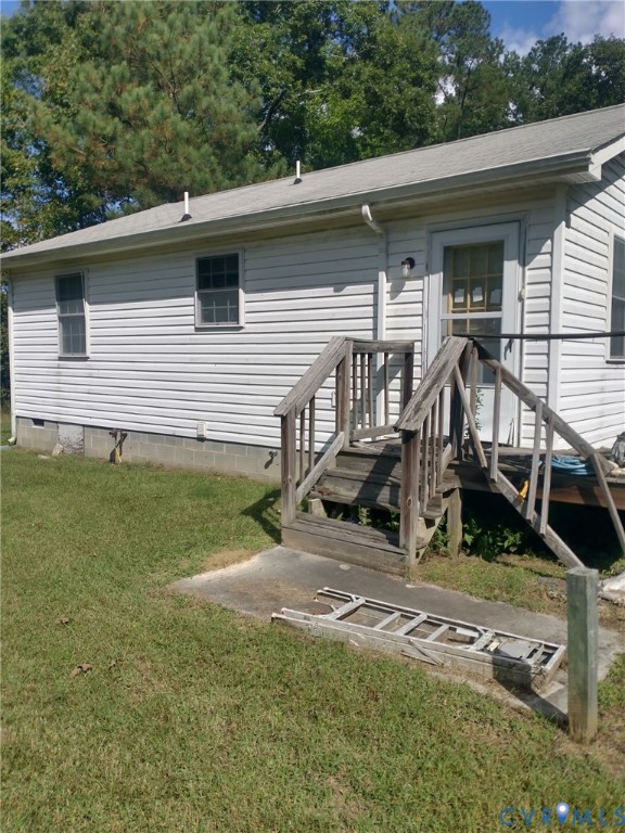 11568 Jerusalem Plank Road Waverly, VA 23890 - Photo 4 of 9 a view of a house with a yard