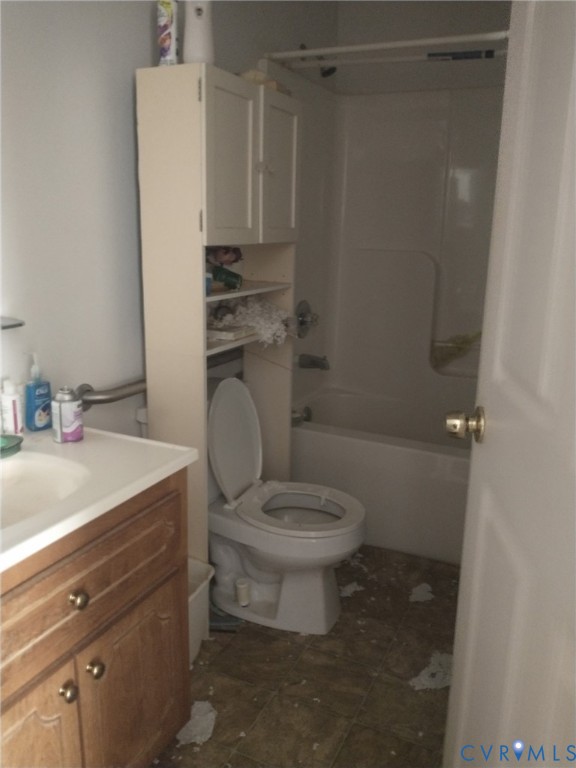 11568 Jerusalem Plank Road Waverly, VA 23890 - Photo 8 of 9 a bathroom with a granite countertop toilet sink and shower