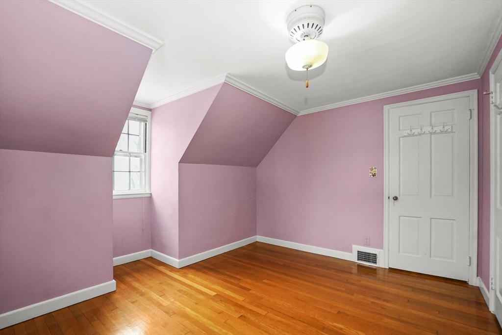33 Severn Street Longmeadow, MA 01106 - Photo 18 of 42 a view of empty room with wooden floor and fan