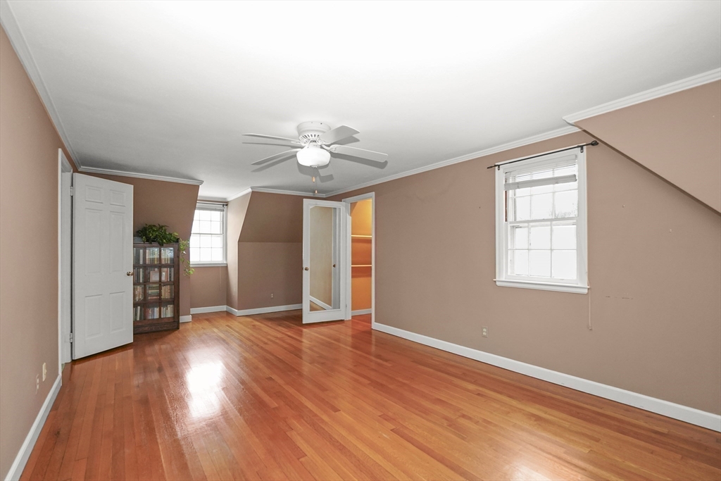 33 Severn Street Longmeadow, MA 01106 - Photo 21 of 42 a view of an empty room with wooden floor and a window