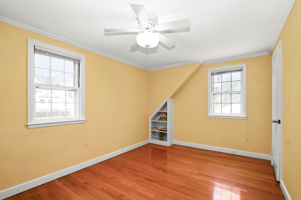 33 Severn Street Longmeadow, MA 01106 - Photo 24 of 42 a view of an empty room with wooden floor and a window