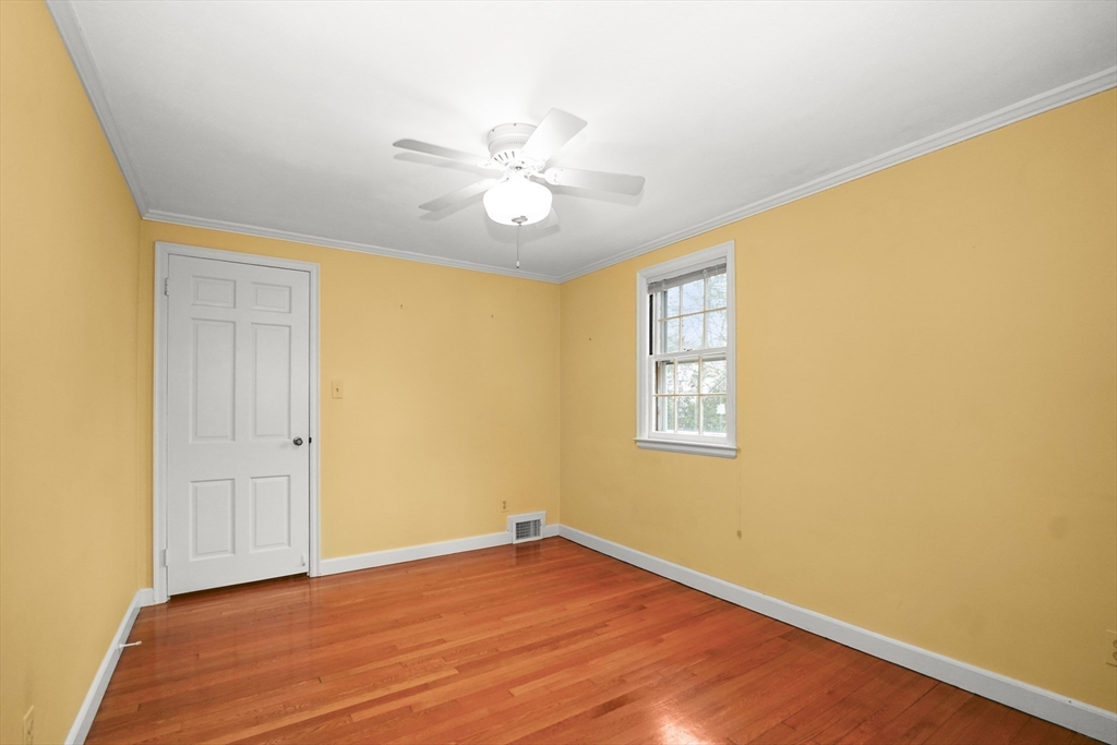 33 Severn Street Longmeadow, MA 01106 - Photo 25 of 42 a view of an empty room with window and wooden floor