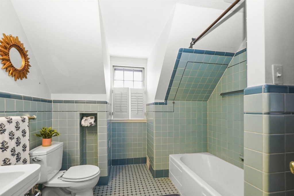 33 Severn Street Longmeadow, MA 01106 - Photo 26 of 42 a bathroom with a sink a toilet and shower