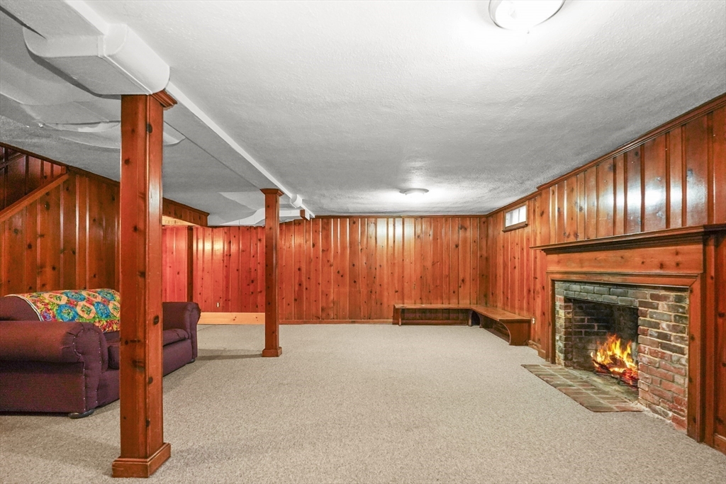33 Severn Street Longmeadow, MA 01106 - Photo 30 of 42 a view of an empty room with a fireplace