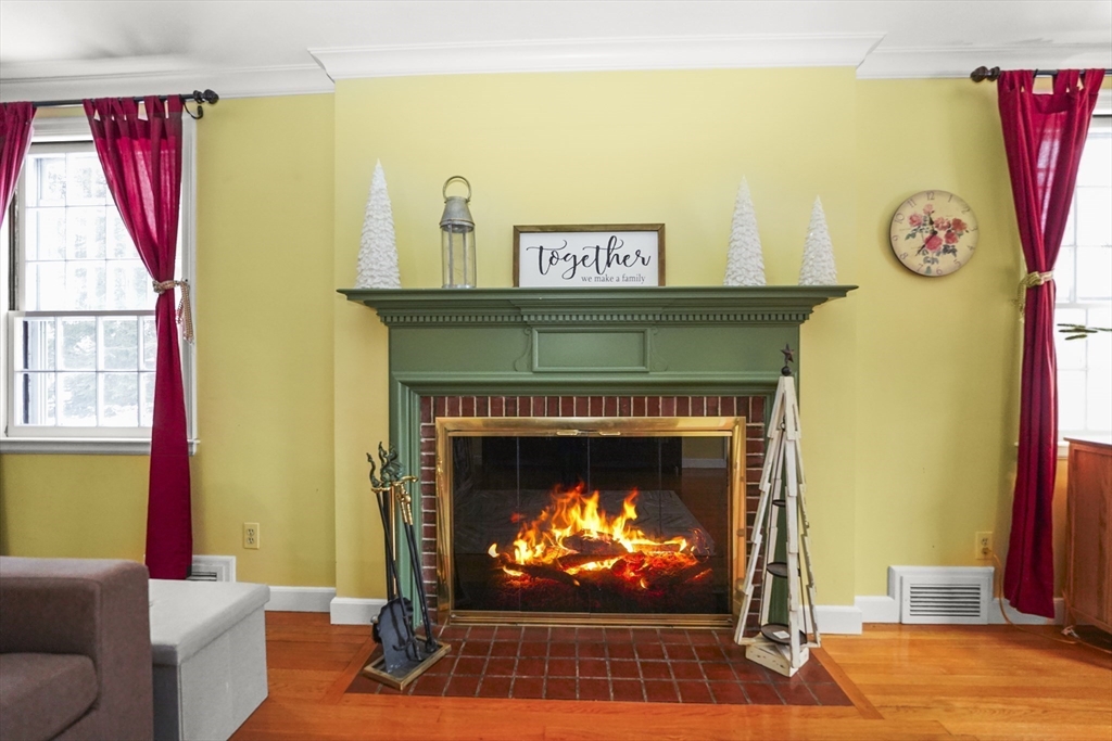 33 Severn Street Longmeadow, MA 01106 - Photo 10 of 42 a living room with furniture and a fireplace