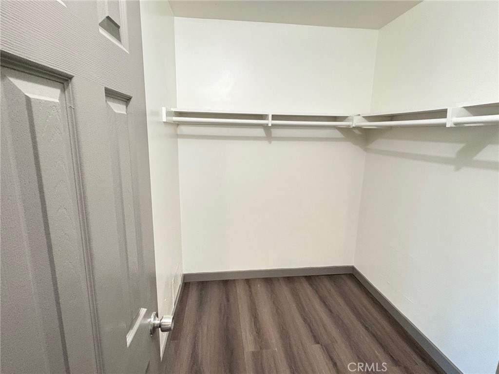 8641 Cerritos Avenue, Unit F Stanton, CA 90680 - Photo 8 of 8 a view of walk in closet with empty racks