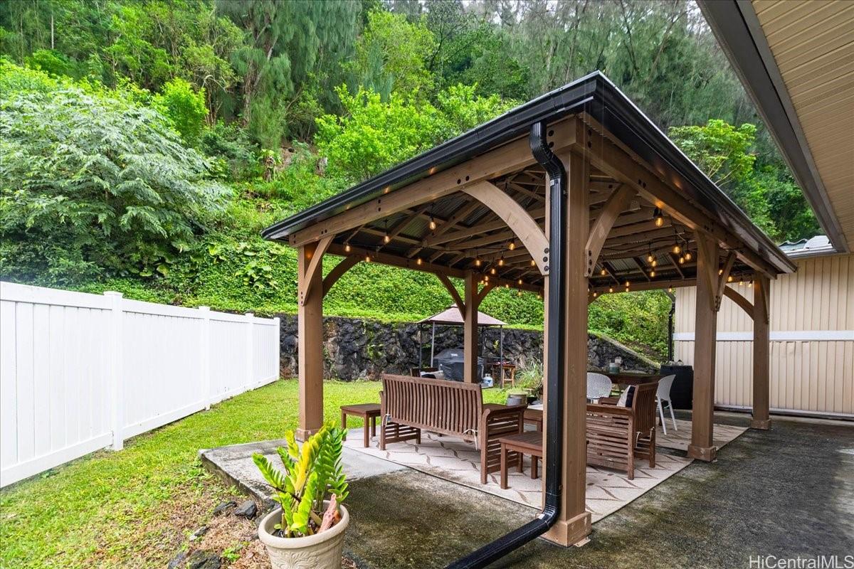 238 Puiwa Road Honolulu, HI 96817 - Photo 13 of 25 Outdoor Gazebo with lush hillside in the back of the property.
