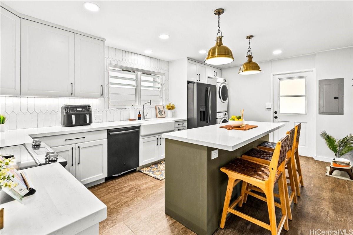 238 Puiwa Road Honolulu, HI 96817 - Photo 5 of 25 Another view of the kitchen with the door to the carport in the background.