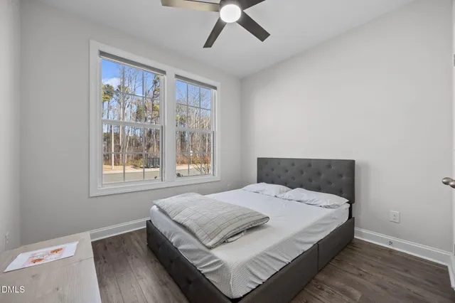 a kitchen with kitchen island a sink and a window