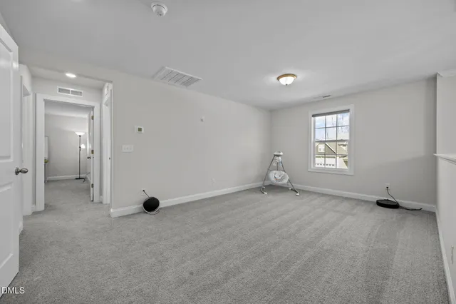 a bathroom with a double vanity sink mirror and shower