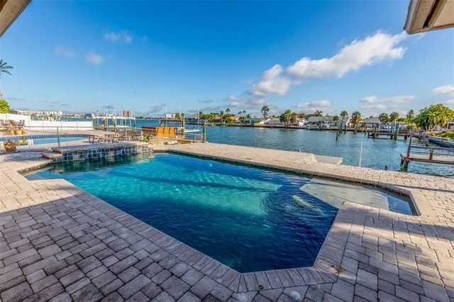 a view of a lake with a yard