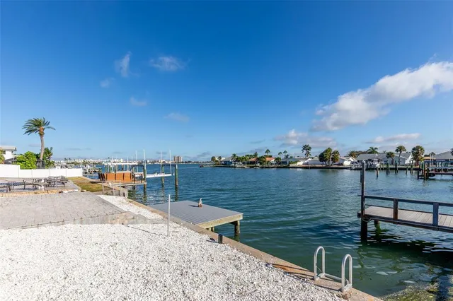 a view of a lake with boats