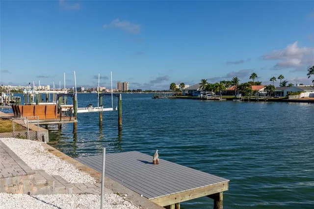 a wooden floor with a view of lake