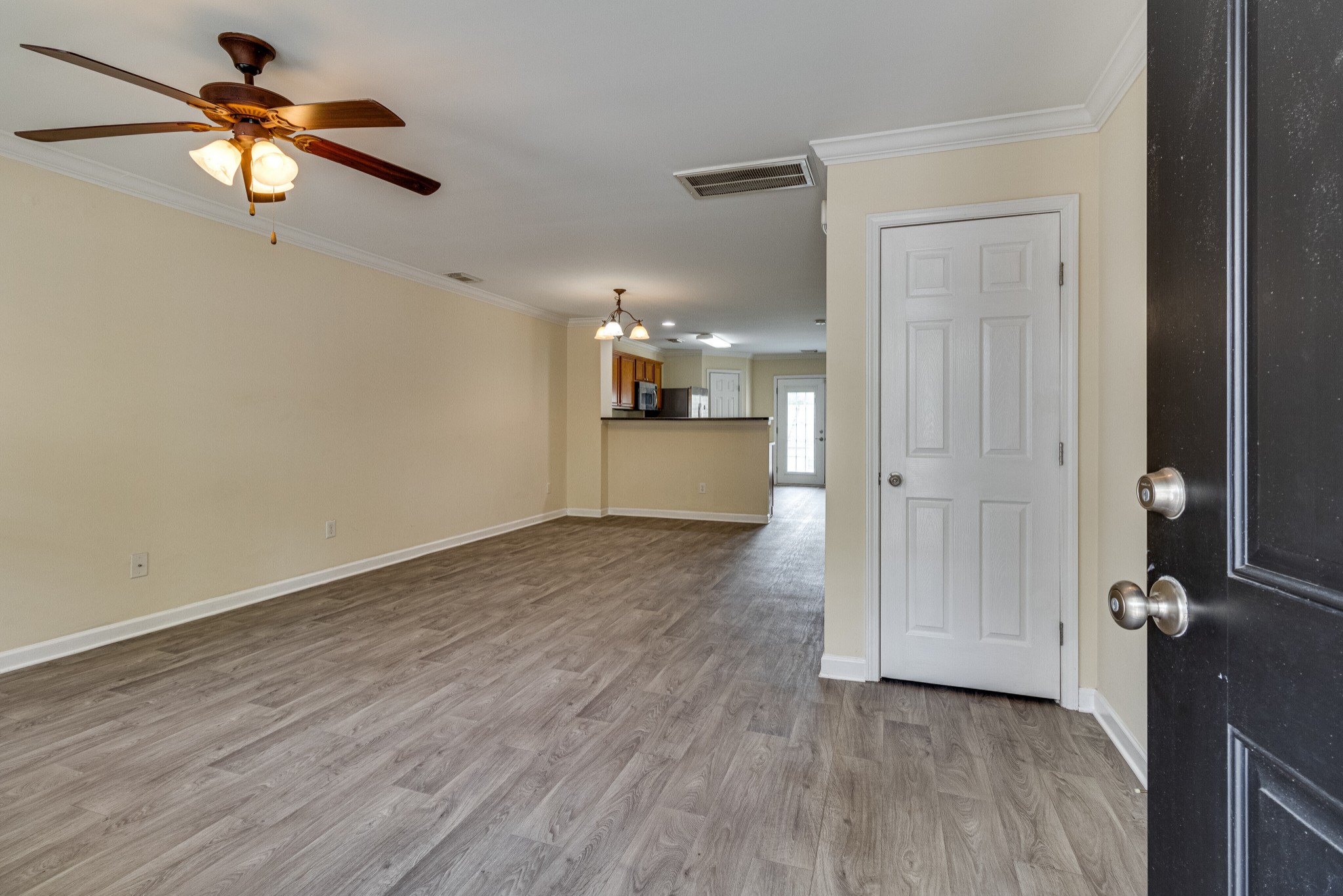 1382 Rural Hill Road, Unit 154 Antioch, TN 37013 - Photo 3 of 22 wooden floor in an empty room with a window