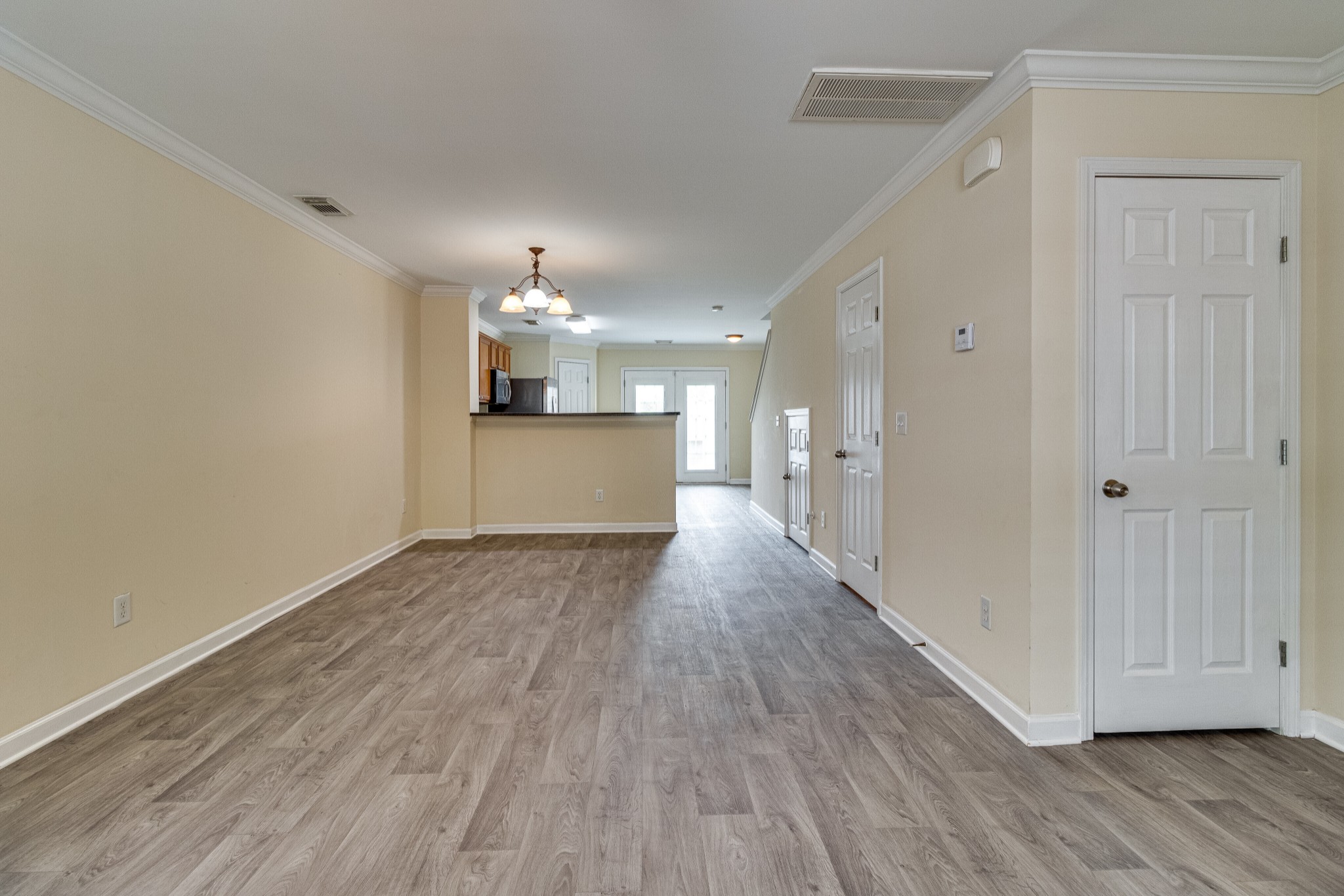 1382 Rural Hill Road, Unit 154 Antioch, TN 37013 - Photo 5 of 22 a view of a big room with wooden floor and windows