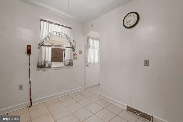 a view of a hallway with closet