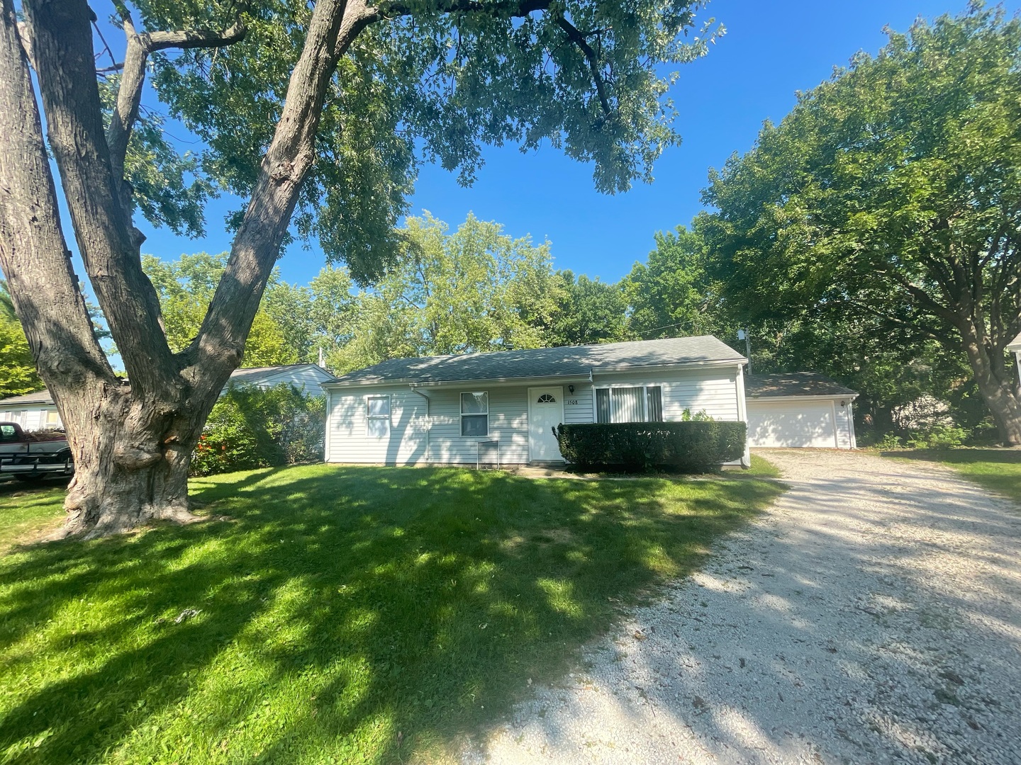 1508 Centennial Drive Champaign, IL 61821 - Photo 2 of 2 a view of a house with a yard