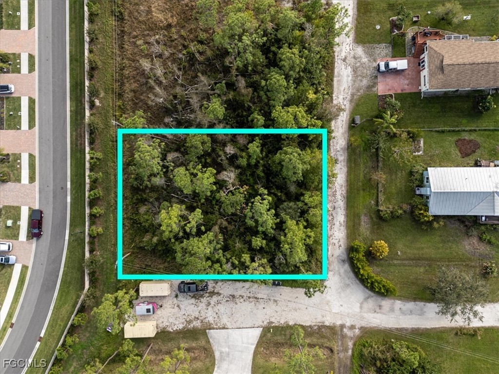 20384 Idlewood Road North Fort Myers, FL 33917 - Photo 1 of 16 an outdoor view from a garden
