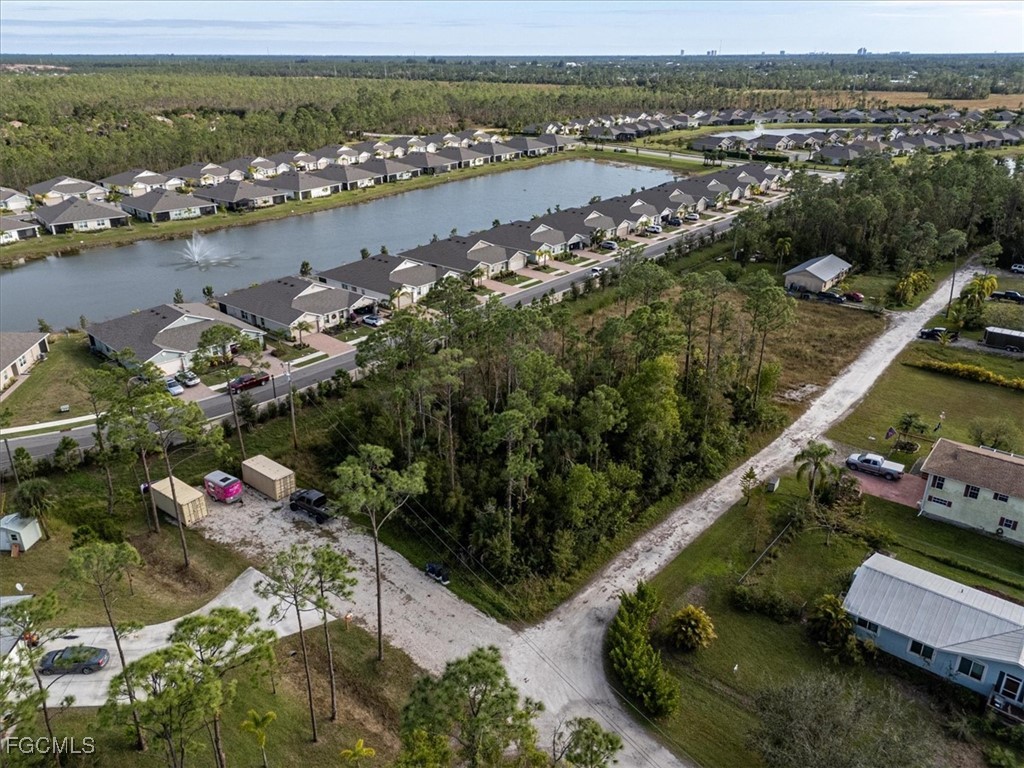 20384 Idlewood Road North Fort Myers, FL 33917 - Photo 12 of 16 view of a lake with a mountain view