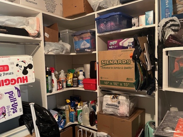 479 River Bend Road, Unit 111 Naperville, IL 60540 - Photo 24 of 25 a store room with lots of different colored cloths