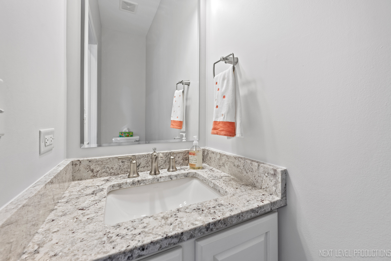 479 River Bend Road, Unit 111 Naperville, IL 60540 - Photo 10 of 25 a bathroom with a granite countertop sink and a mirror