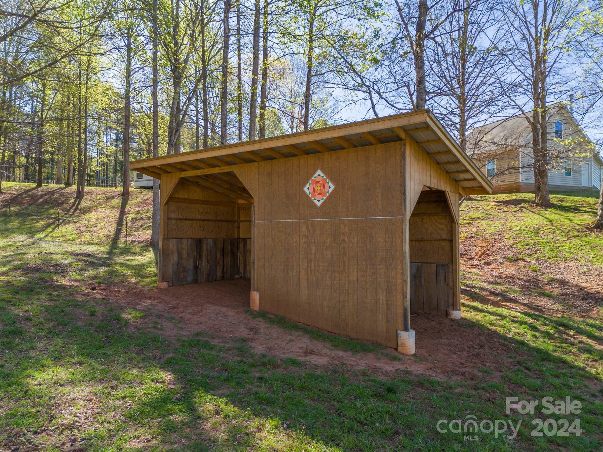 1975 Whiteside Road Mill Spring, NC 28756 - Photo 6 of 37 a view of backyard space and garden