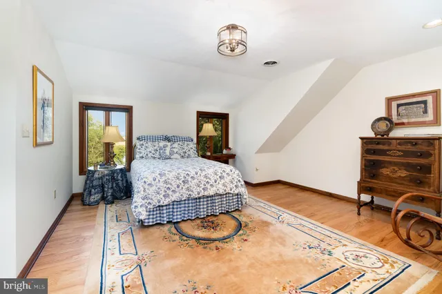 a bathroom with a tub a sink and a shower