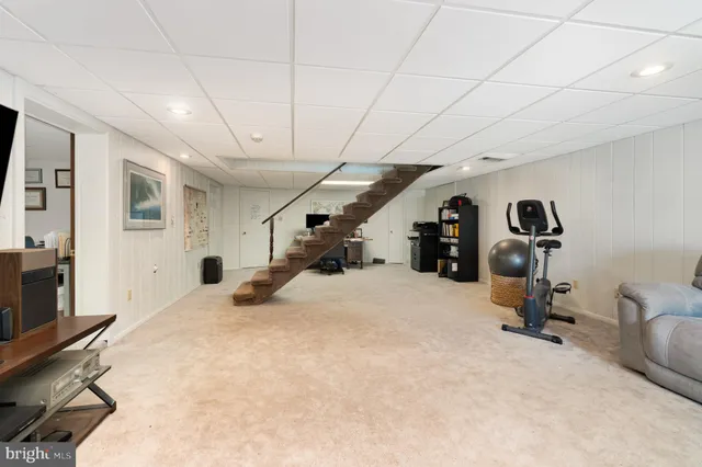 a view of a swimming pool with a yard