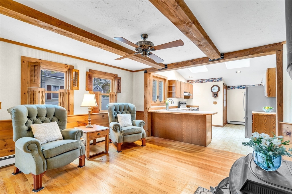 111 Spring Street Marlborough, MA 01752 - Photo 12 of 42 a living room with furniture and wooden floor