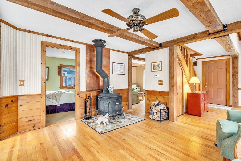 111 Spring Street Marlborough, MA 01752 - Photo 15 of 42 a bedroom with furniture and wooden floor