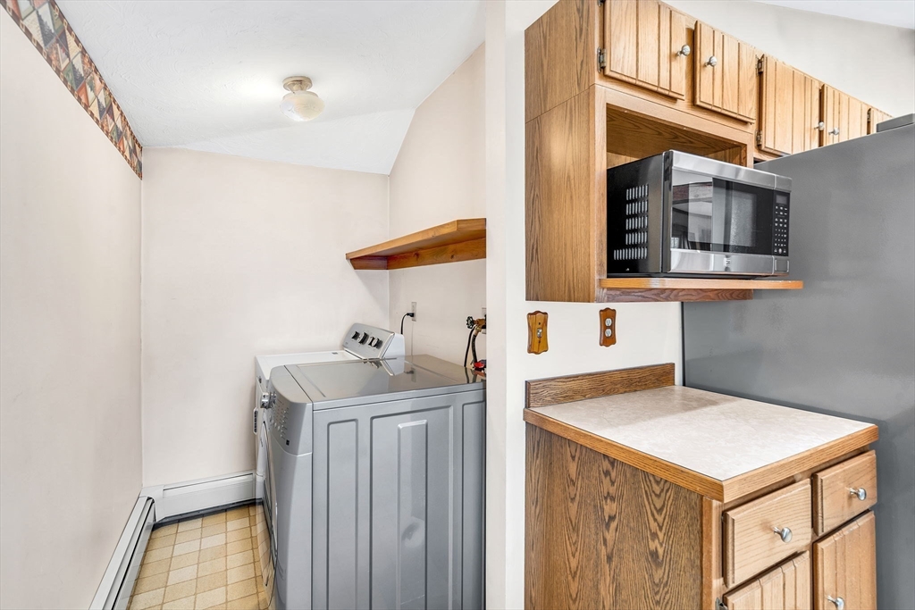 111 Spring Street Marlborough, MA 01752 - Photo 21 of 42 a utility room with dryer and washer