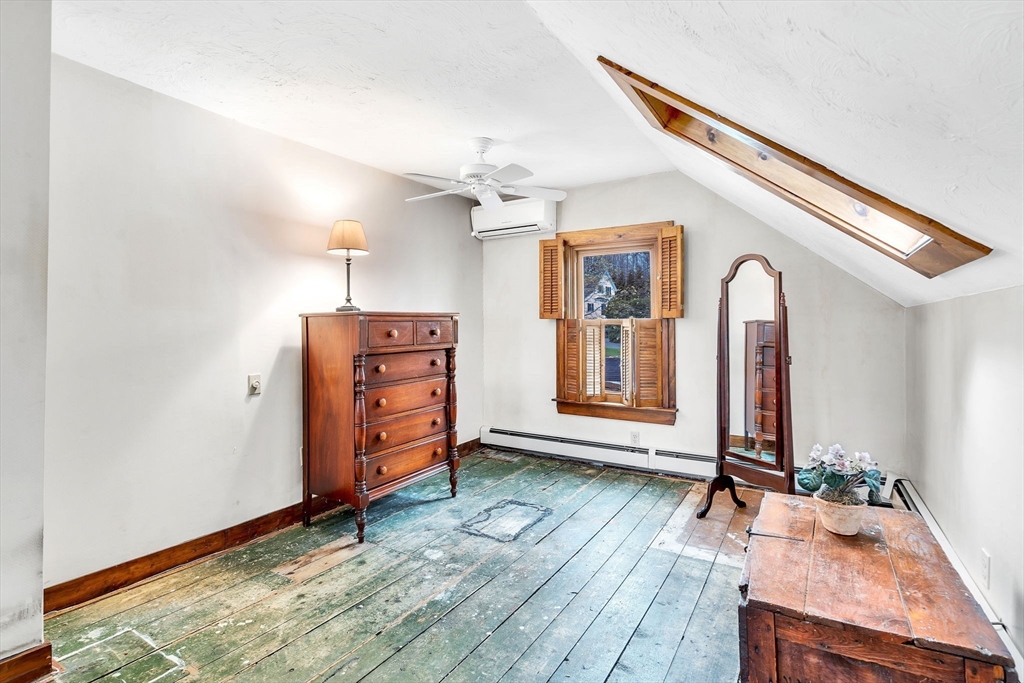 111 Spring Street Marlborough, MA 01752 - Photo 30 of 42 a view of a livingroom with furniture and wooden floor