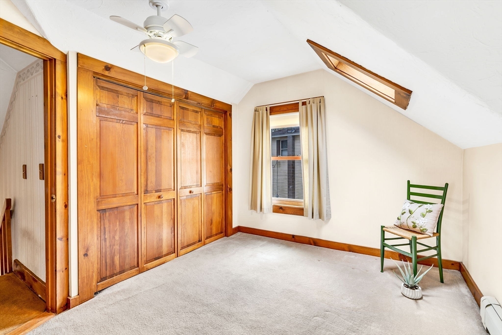 111 Spring Street Marlborough, MA 01752 - Photo 33 of 42 a view of a livingroom with furniture and a window